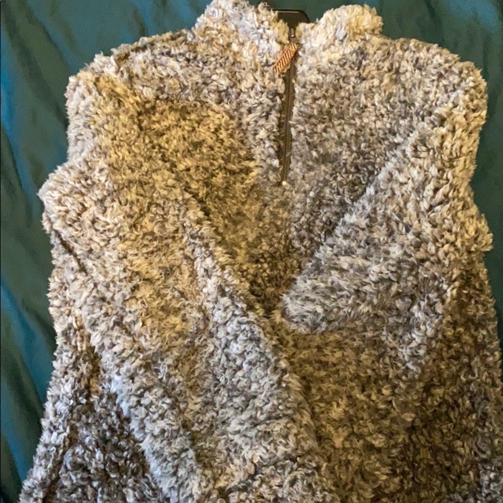 a fully black and white sweater